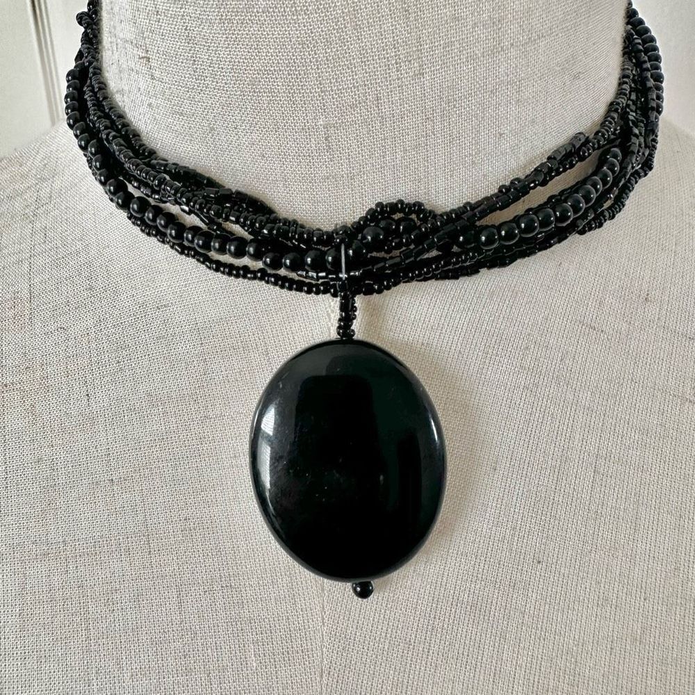 Black multi strand pendant necklace